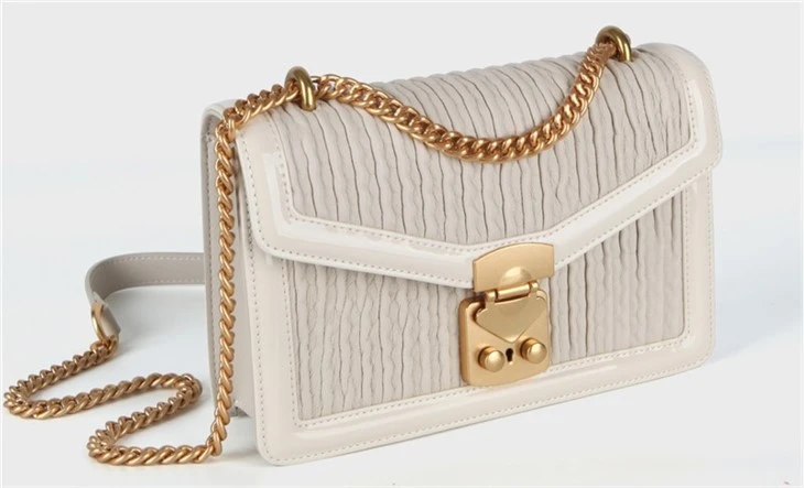 white luxury cross body purse